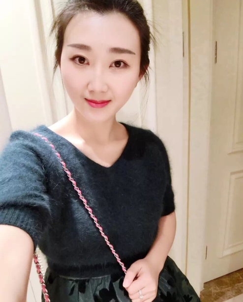 小妮的第三张照片--周宁婚介网