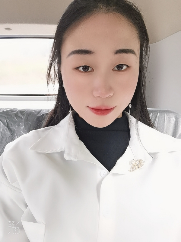 丽丽的第三张照片--周宁婚介网